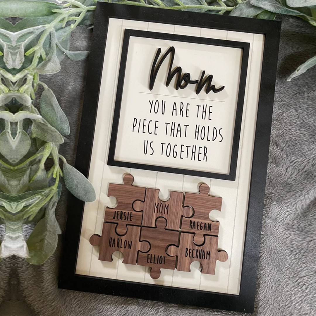  You are the piece that hold us together Black Frame White background Laser Engraved Personalized Wood Mom Puzzle Sign.